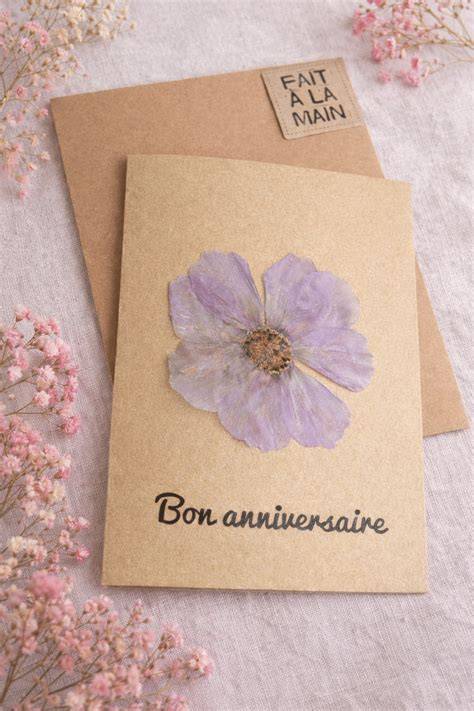 visuels: message dans une carte et fleurs