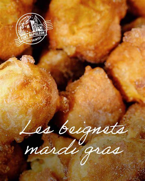 Beignets de carnaval dans une friture dorée