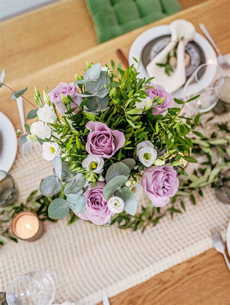 centre de table fleurs fuchsia parme