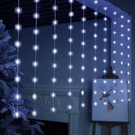 LED flocons et renne suspendus fenêtre