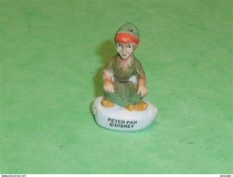 feve peter pan en mat montre motif et patine