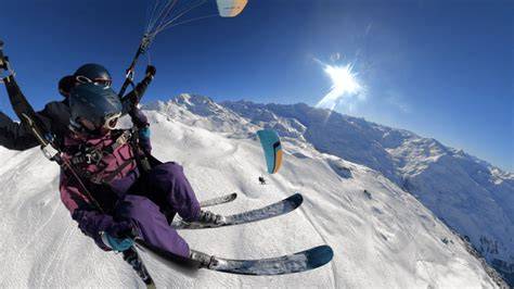 Décollage en parapente à ski aux Menuires