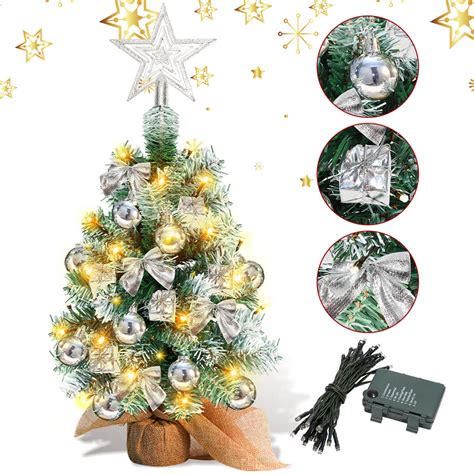 Guirlande argentée autour sapin Noël