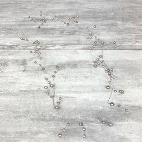 Fils de guirlande avec perles en bois